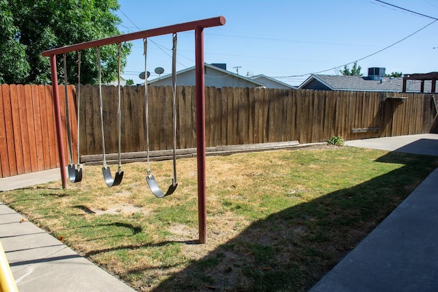 1913 N Waukena Way, Hanford, CA 93230 - view of yard with a playground and central AC unit