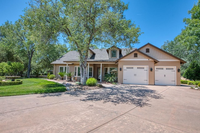 47307 Sunshine Terrace Dr, Coarsegold, CA 93614 - view of front facade with driveway, an attached garage, a front lawn, a shingled roof, and a porch
