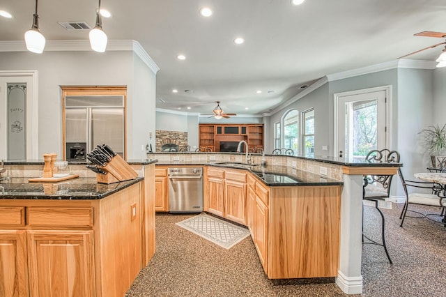 47307 Sunshine Terrace Dr, Coarsegold, CA 93614 - kitchen featuring ceiling fan, recessed lighting, ornamental molding, a kitchen breakfast bar, and stainless steel built in refrigerator