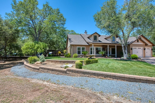 47307 Sunshine Terrace Dr, Coarsegold, CA 93614 - cape cod-style house featuring a garage, a front lawn, driveway, and a chimney