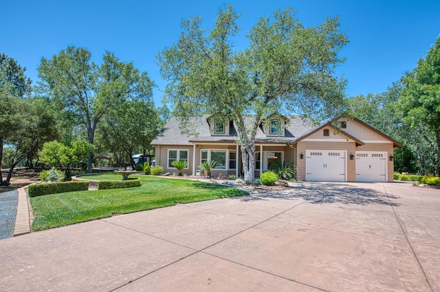 47307 Sunshine Terrace Dr, Coarsegold, CA 93614 - view of front of property with concrete driveway, a front lawn, an attached garage, and a porch