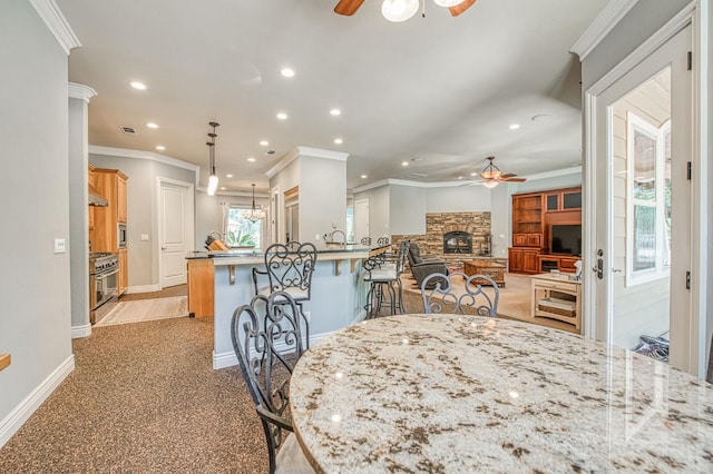 47307 Sunshine Terrace Dr, Coarsegold, CA 93614 - dining area with a ceiling fan, recessed lighting, ornamental molding, baseboards, and light colored carpet
