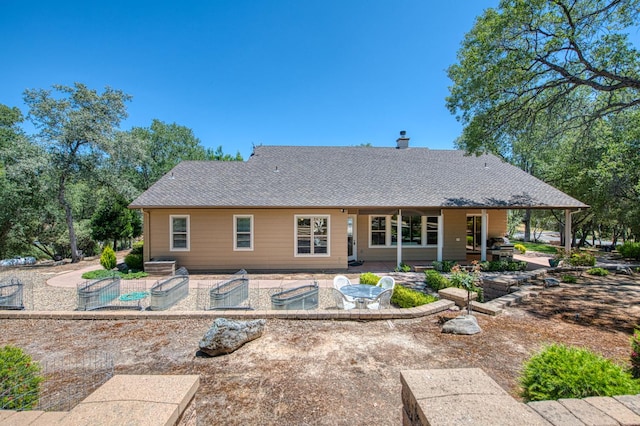 47307 Sunshine Terrace Dr, Coarsegold, CA 93614 - rear view of property featuring a chimney, a patio, and a shingled roof