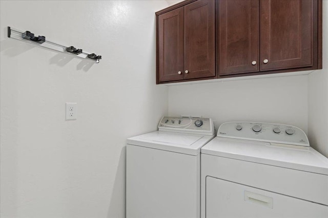 1799 Bolton Ave, Tulare, CA 93274 - washroom featuring washing machine and clothes dryer and cabinet space