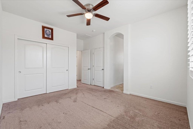 1799 Bolton Ave, Tulare, CA 93274 - unfurnished bedroom featuring carpet flooring, a closet, baseboards, and ceiling fan