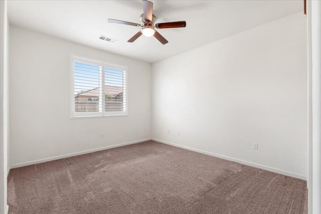 1799 Bolton Ave, Tulare, CA 93274 - carpeted spare room with a ceiling fan and baseboards