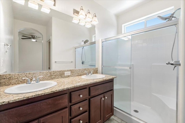 1799 Bolton Ave, Tulare, CA 93274 - full bath with a stall shower, a ceiling fan, and double vanity