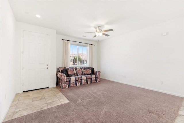 1799 Bolton Ave, Tulare, CA 93274 - living area with ceiling fan, light carpet, and baseboards