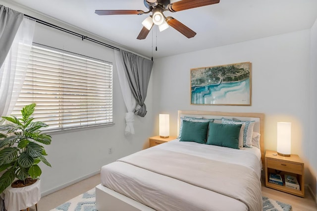 5422 W Calimyrna Ave, Fresno, CA 93722 - bedroom with ceiling fan and baseboards