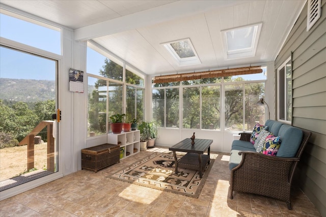34133 Keller Rd, North Fork, CA 93643 - sunroom featuring beam ceiling and a skylight