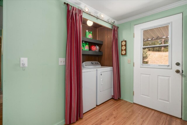 34133 Keller Rd, North Fork, CA 93643 - washroom with washing machine and dryer, light wood finished floors, and ornamental molding