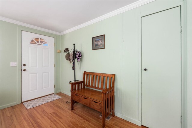 34133 Keller Rd, North Fork, CA 93643 - entrance foyer featuring light wood-style flooring and crown molding