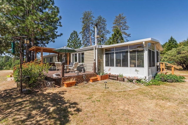 34133 Keller Rd, North Fork, CA 93643 - rear view of property featuring a sunroom and a deck