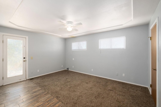 37667 Eagle Dr, Raymond, CA 93653 - carpeted empty room featuring a ceiling fan, baseboards, and wood finished floors
