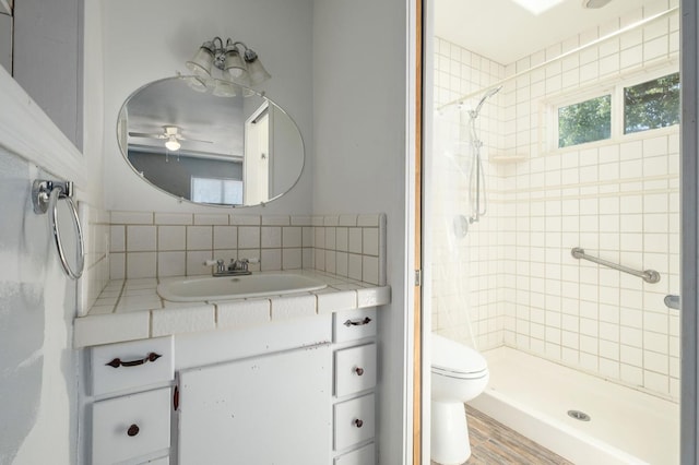 37667 Eagle Dr, Raymond, CA 93653 - full bathroom featuring a shower stall, toilet, vanity, and ceiling fan