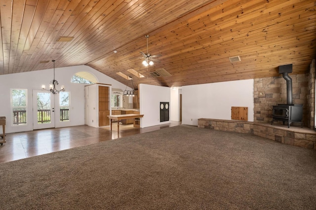37667 Eagle Dr, Raymond, CA 93653 - unfurnished living room featuring a wood stove, a ceiling fan, a chandelier, high vaulted ceiling, and wood ceiling