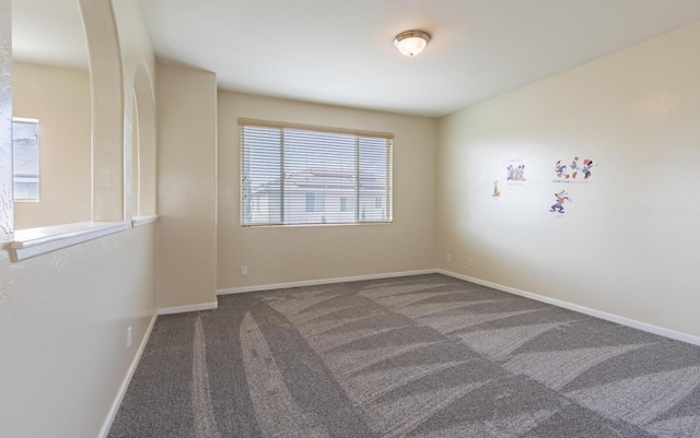 7026 E Dayton Ave, Fresno, CA 93737 - spare room featuring carpet and baseboards