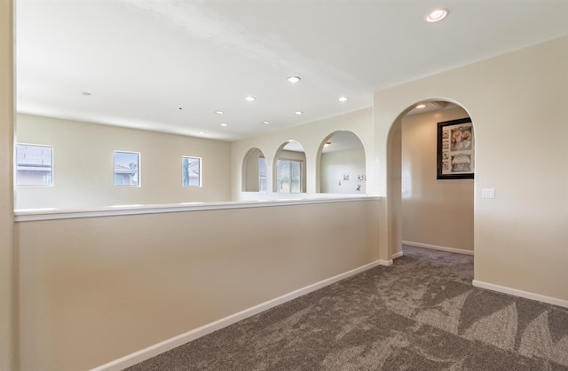 7026 E Dayton Ave, Fresno, CA 93737 - corridor with carpet flooring, recessed lighting, and baseboards