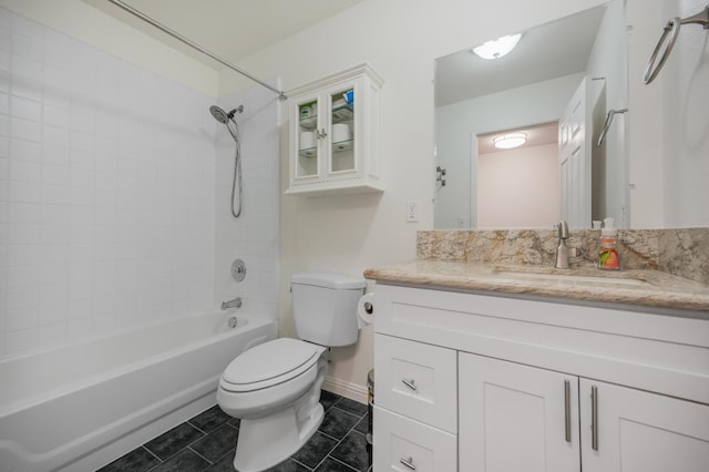 44719 Savage Rd, Coarsegold, CA 93614 - bathroom with vanity, toilet, shower / washtub combination, tile patterned floors, and baseboards