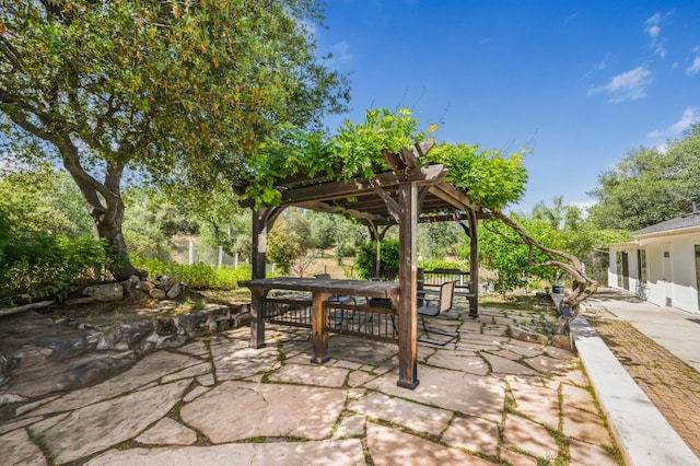 44719 Savage Rd, Coarsegold, CA 93614 - view of patio featuring a pergola and outdoor dining space