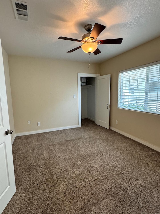 1382 N Thorne Ave, Fresno, CA 93728 - unfurnished bedroom with carpet, a textured ceiling, baseboards, ceiling fan, and a closet