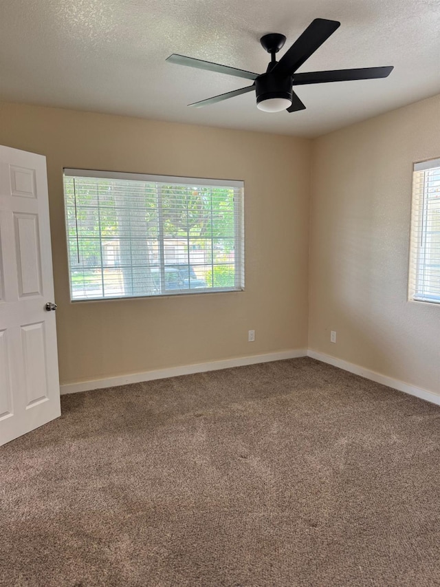 1382 N Thorne Ave, Fresno, CA 93728 - carpeted spare room featuring a ceiling fan, a textured ceiling, and baseboards