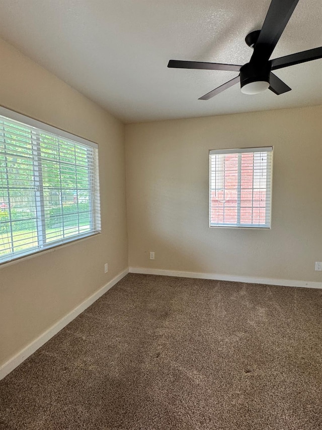 1382 N Thorne Ave, Fresno, CA 93728 - unfurnished room with ceiling fan, carpet floors, and baseboards
