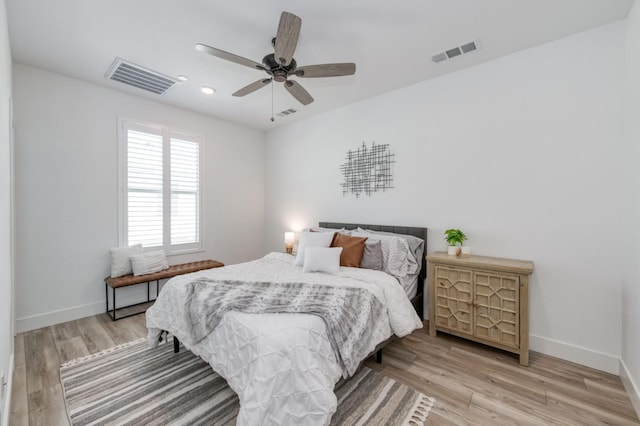 2867 E Tamarind Dr, Fresno, CA 93730 - bedroom featuring light wood-type flooring, baseboards, ceiling fan, and recessed lighting