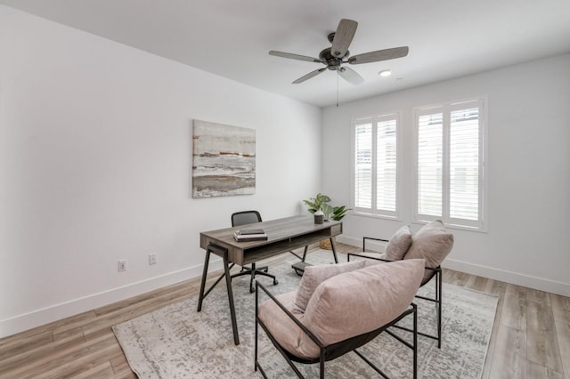 2867 E Tamarind Dr, Fresno, CA 93730 - home office with baseboards, light wood-type flooring, and a ceiling fan