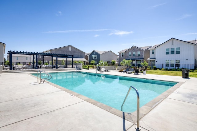 2867 E Tamarind Dr, Fresno, CA 93730 - community pool featuring a pergola, a residential view, and a patio area