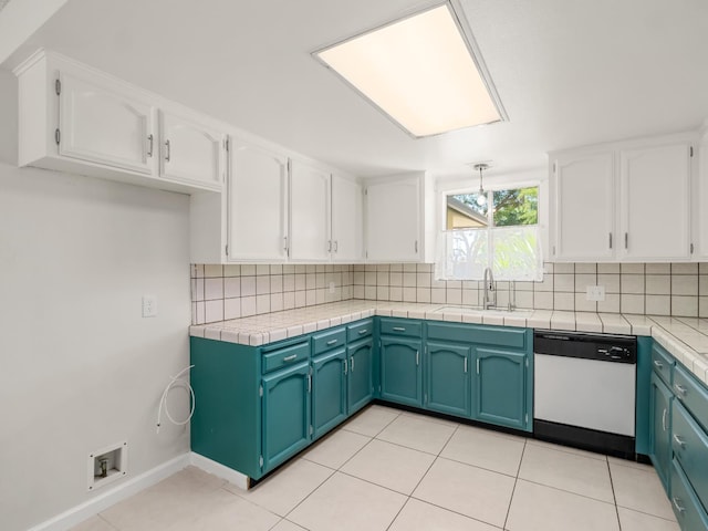 1646 W Millbrae Ave, Fresno, CA 93711 - kitchen featuring white dishwasher, white cabinets, decorative backsplash, and a sink
