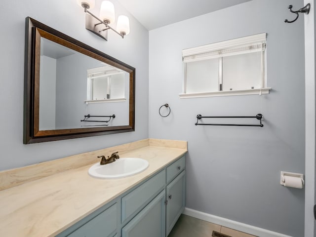 1646 W Millbrae Ave, Fresno, CA 93711 - bathroom with vanity and baseboards