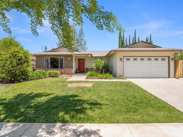 1646 W Millbrae Ave, Fresno, CA 93711 - single story home featuring a garage, driveway, a front yard, and stucco siding