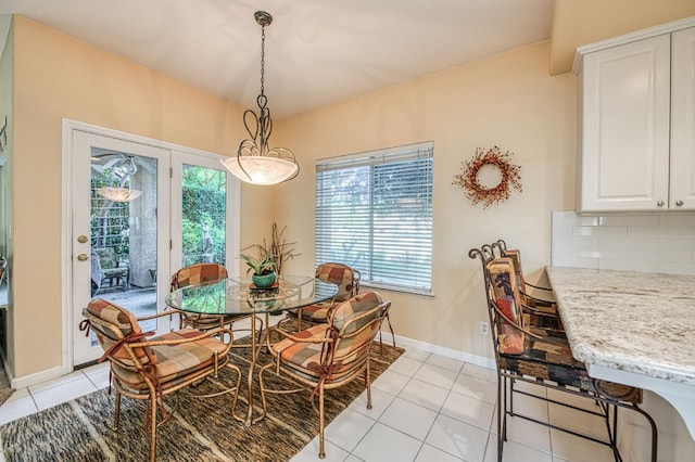2895 W Kensington Ln, Fresno, CA 93711 - dining space with light tile patterned floors and baseboards