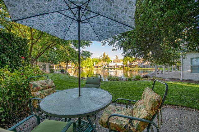 2895 W Kensington Ln, Fresno, CA 93711 - view of patio / terrace featuring a water view