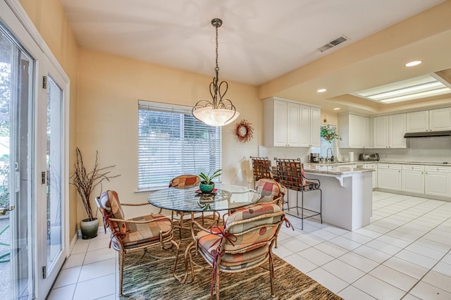 2895 W Kensington Ln, Fresno, CA 93711 - dining room with light tile patterned floors and recessed lighting