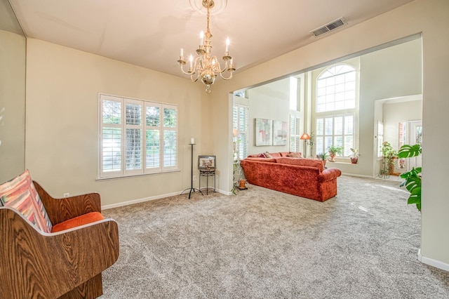 2895 W Kensington Ln, Fresno, CA 93711 - sitting room with a chandelier, carpet flooring, and baseboards