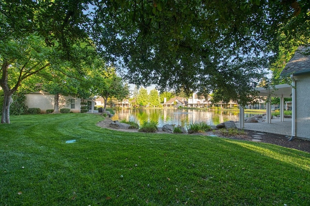 2895 W Kensington Ln, Fresno, CA 93711 - view of green lawn with a water view
