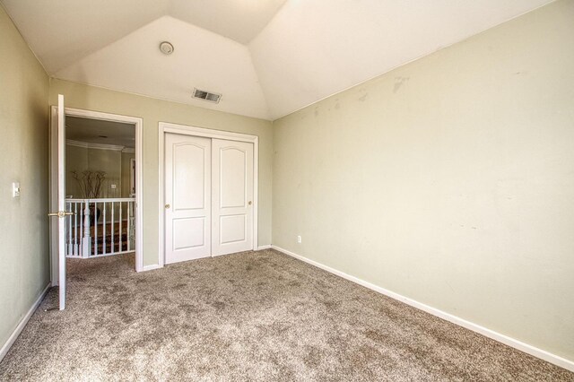 2895 W Kensington Ln, Fresno, CA 93711 - unfurnished bedroom with carpet floors, a closet, lofted ceiling, and baseboards