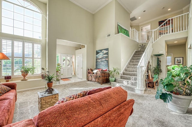 2895 W Kensington Ln, Fresno, CA 93711 - living room with carpet, a high ceiling, stairs, ornamental molding, and recessed lighting