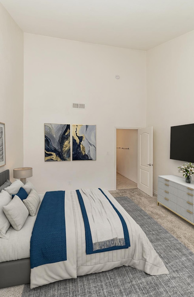 7178 N Fruit Ave Unit 115, Fresno, CA 93711 - carpeted bedroom featuring a high ceiling