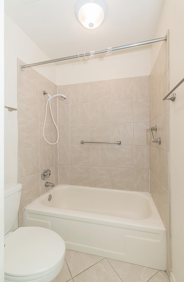 7178 N Fruit Ave Unit 115, Fresno, CA 93711 - full bath featuring tile patterned flooring, toilet, and washtub / shower combination