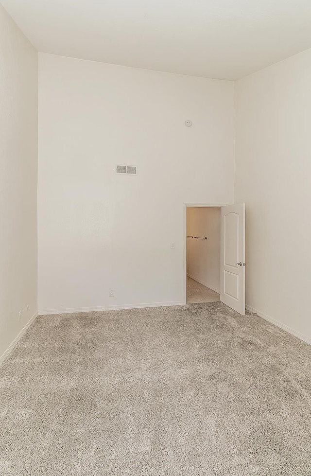 7178 N Fruit Ave Unit 115, Fresno, CA 93711 - empty room featuring light carpet and baseboards