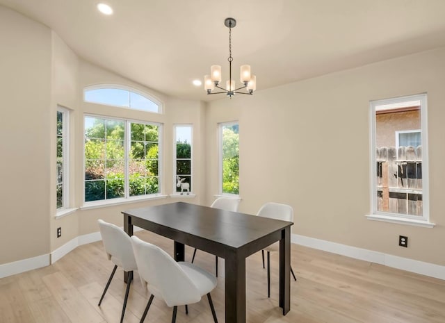 1656 N Cecelia Ave, Fresno, CA 93722 - dining room featuring a chandelier, light wood-style floors, baseboards, and recessed lighting