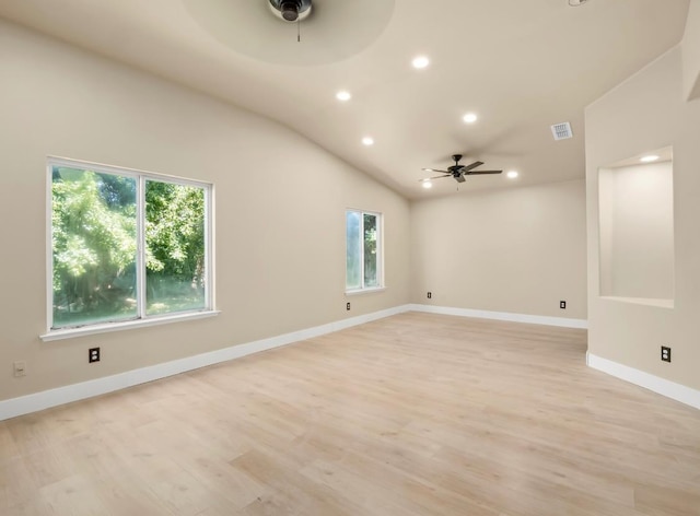 1656 N Cecelia Ave, Fresno, CA 93722 - empty room featuring a ceiling fan, recessed lighting, light wood-type flooring, baseboards, and vaulted ceiling