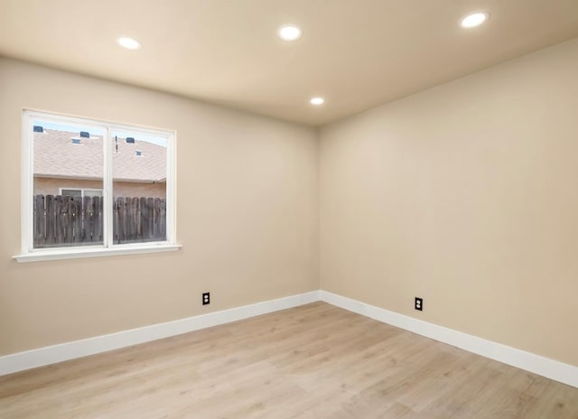 1656 N Cecelia Ave, Fresno, CA 93722 - unfurnished room with recessed lighting, baseboards, and light wood-style floors