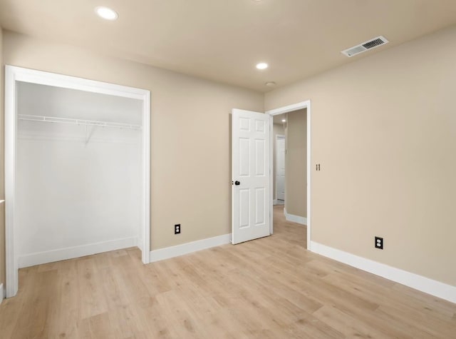 1656 N Cecelia Ave, Fresno, CA 93722 - unfurnished bedroom featuring recessed lighting, light wood finished floors, baseboards, and a closet