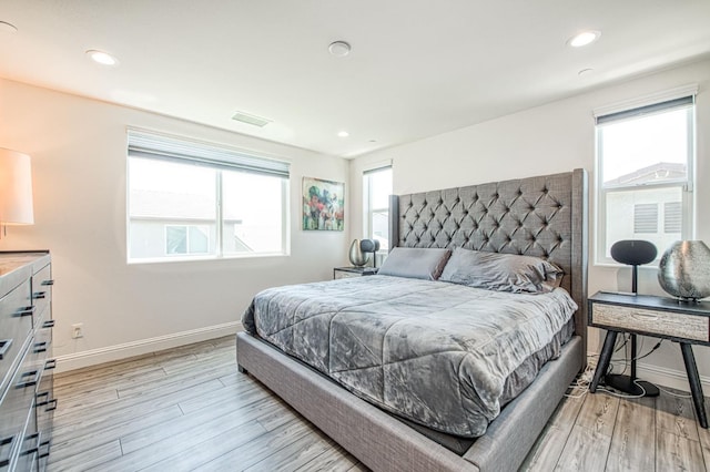 4148 Beverly Ave, Clovis, CA 93619 - bedroom with baseboards, light wood-type flooring, and recessed lighting
