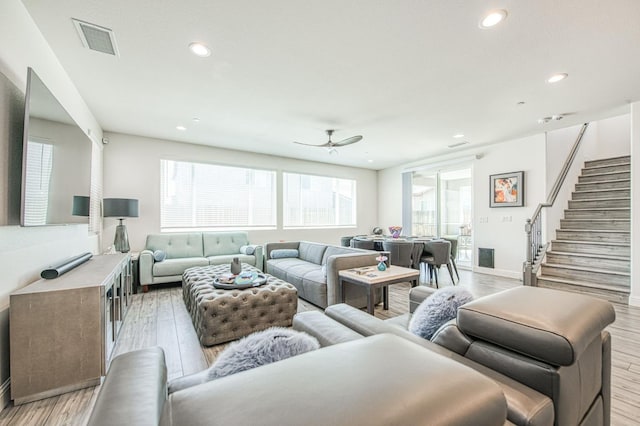 4148 Beverly Ave, Clovis, CA 93619 - living room with healthy amount of natural light, light wood finished floors, a ceiling fan, recessed lighting, and baseboards