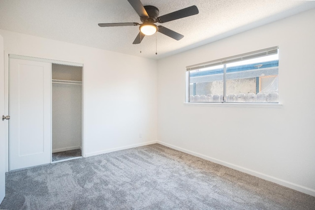 1617 W Indianapolis Ave, Fresno, CA 93705 - unfurnished bedroom with carpet flooring, a closet, baseboards, and ceiling fan